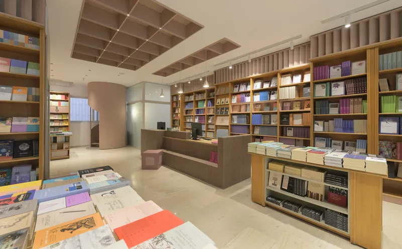 CUP Publications, Central flagship bookshop by P.O.N.I Architects, image 7